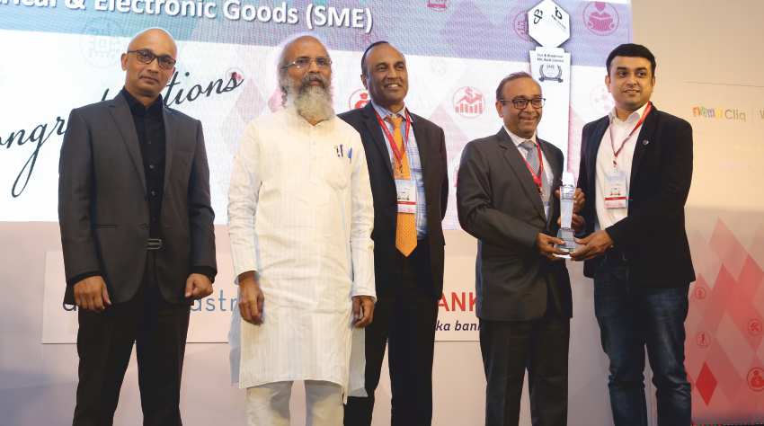 Dhirendra Savla Director Matrix Comsec (L) Receiving the Award[Business Excellence Award,telecom,telecom security]